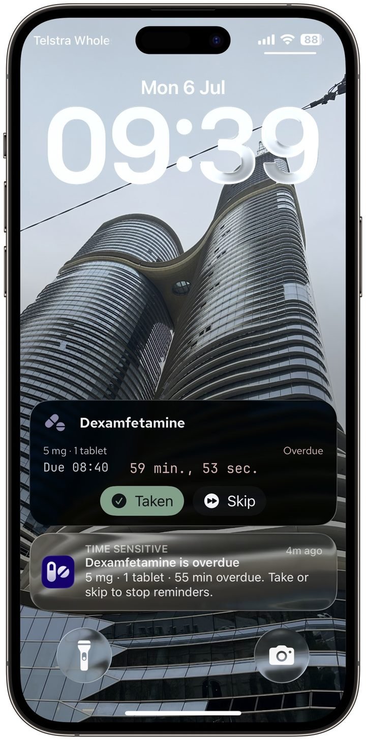 Lock screen showing a Dexamfetamine Live Activity — name across the top, 5 mg and 1 tablet with Due 08:40 on the left, a live counter on the right, and Taken and Skip buttons