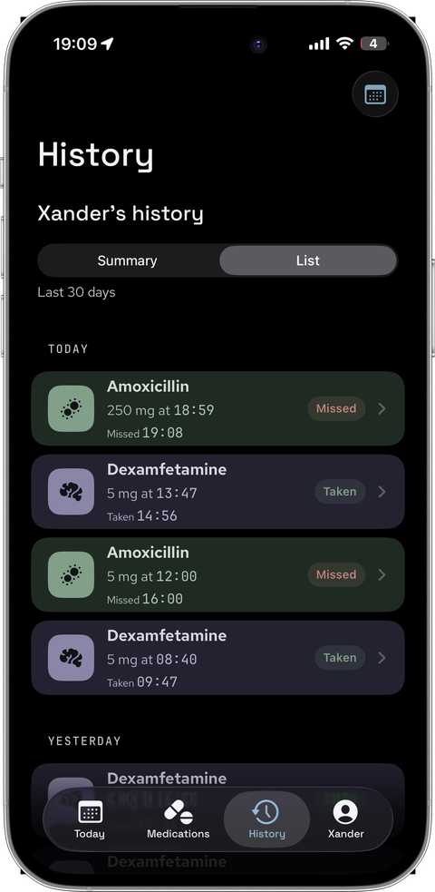 Silver iPhone showing the PillBox History list with the dose recorded as Missed